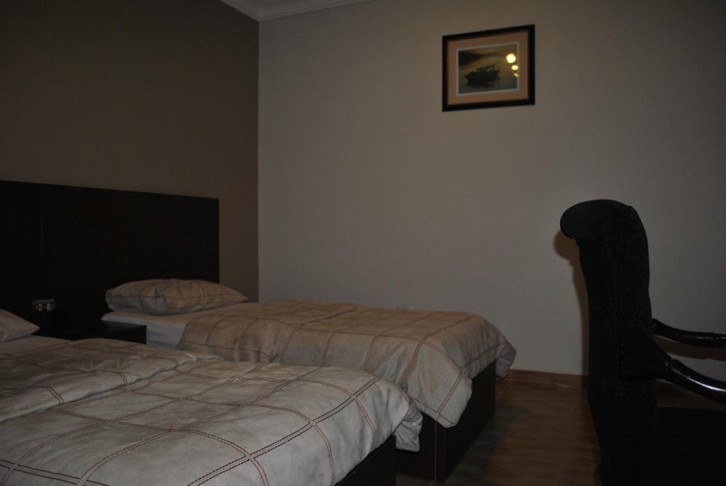 Alballouti Hotel Suites Amman Chambre photo