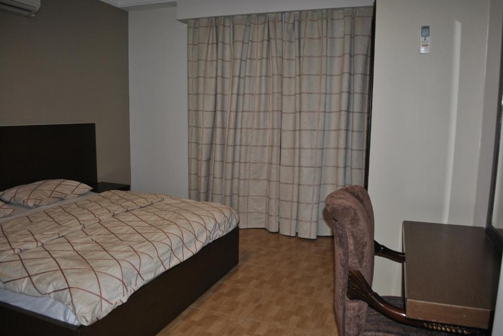 Alballouti Hotel Suites Amman Chambre photo
