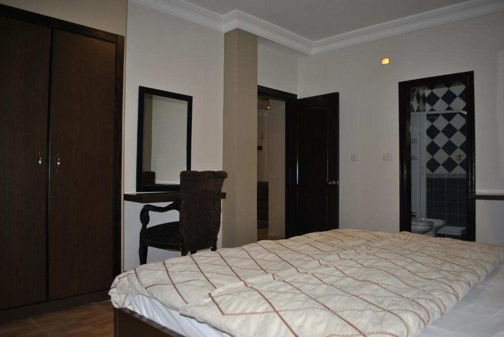 Alballouti Hotel Suites Amman Chambre photo